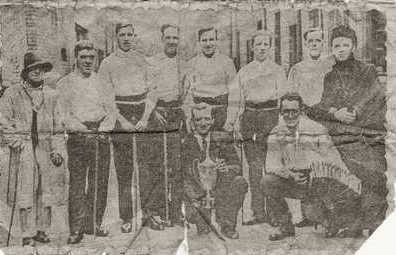 Tommy Davison holding Morris Dancing cup